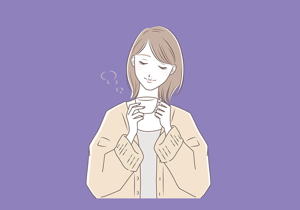 コーヒーをのむ女性